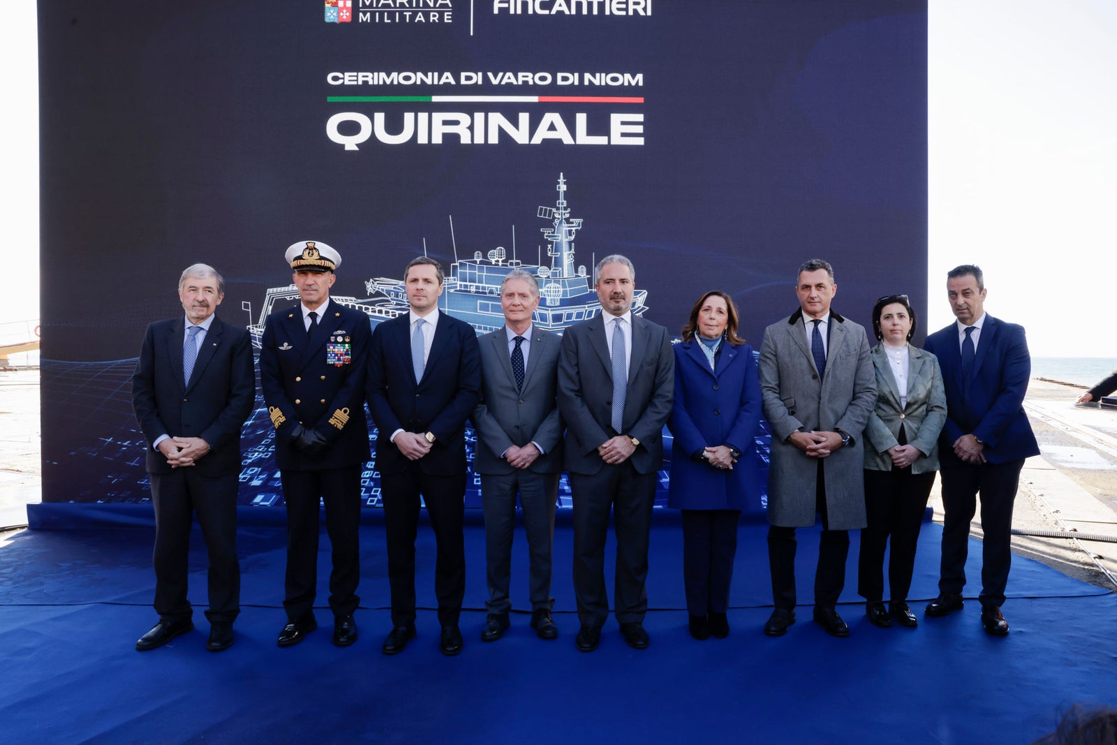 Newsroom - Press releases - 2026 - Fincantieri Group: Launch of the Italian Navy's "Quirinale" major hydro-oceanographic ship: italian navy and fincantieri leadership group poses in front of official launch backdrop for quirinale.