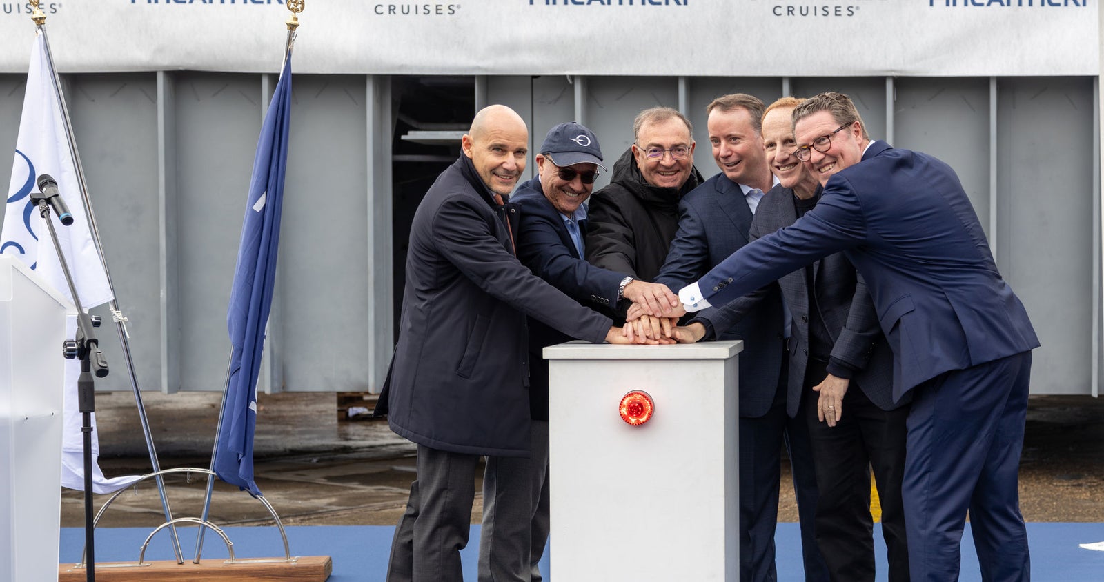 Newsroom - Press releases - 2026 - Fincantieri Group: keel laying of oceania sonata in marghera: executives from fincantieri and oceania cruises press the ceremonial button together during keel laying event.