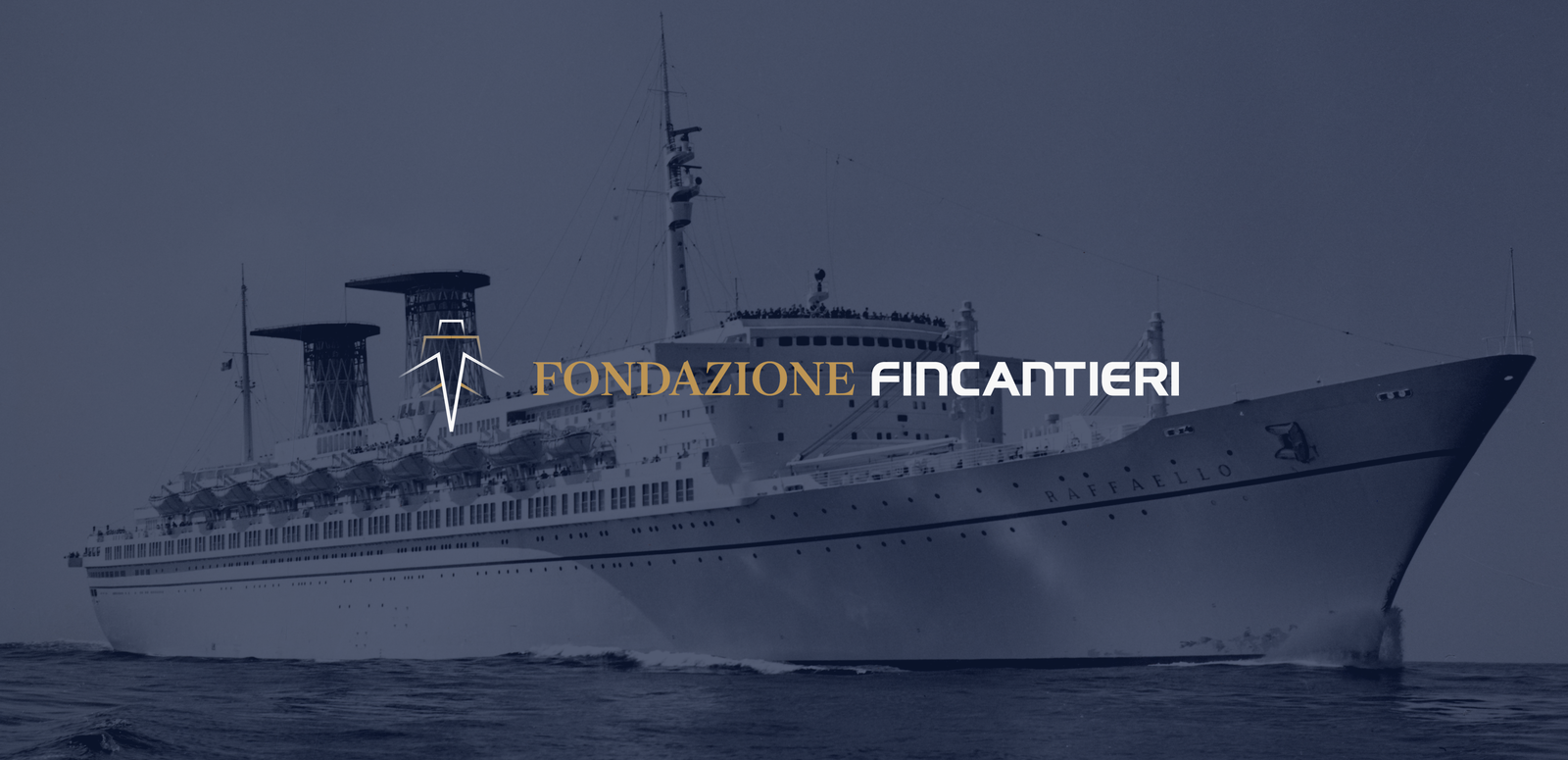 Fincantieri | About Us - Historic Ships: Black and white photo of a large cruise ship named Oceanic sailing on calm waters, side view with funnel visible at the stern, mountain chains near the coast in the background.