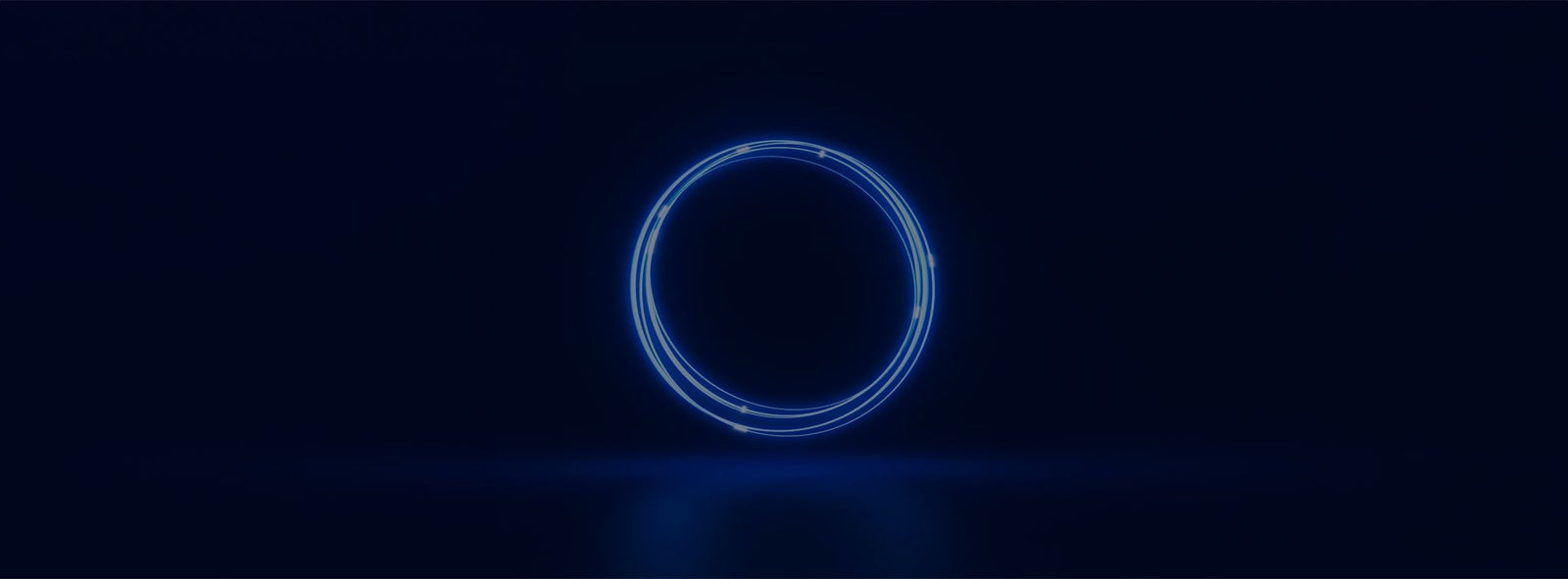 Fincantieri | Group - Innovation - Smart Manufacturing System - ML & GEN AI: Bright blue ring suspended on a dark blue background, made up of thin shining filaments.