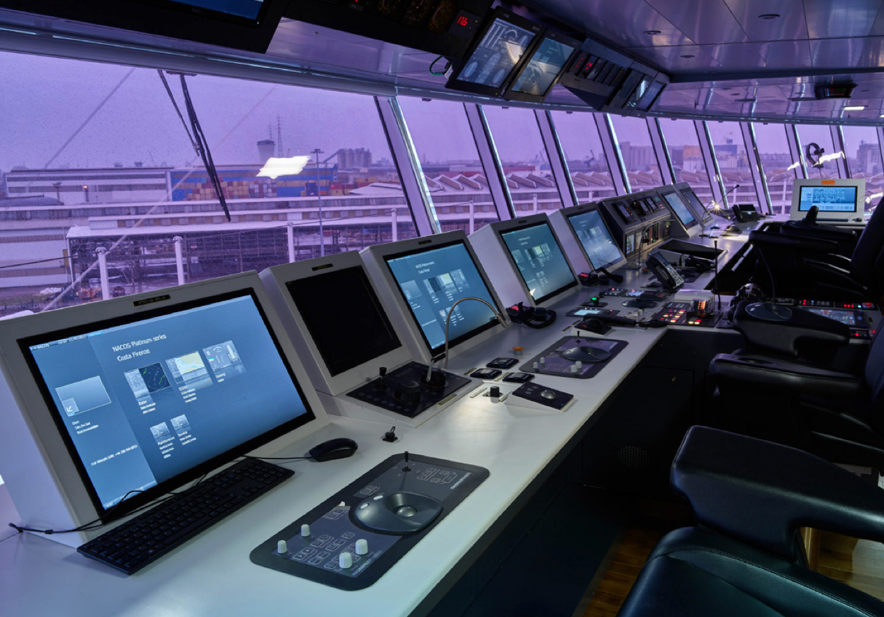 Fincantieri | Group - Sustainability - Responsible Culture - Cybersecurity Management: High-tech ship control room with multiple monitors and command panels, spacious bridge overlooking the port through large windows, screens displaying navigational and operational data, soft purple lighting; professional and technologically advanced atmosphere.