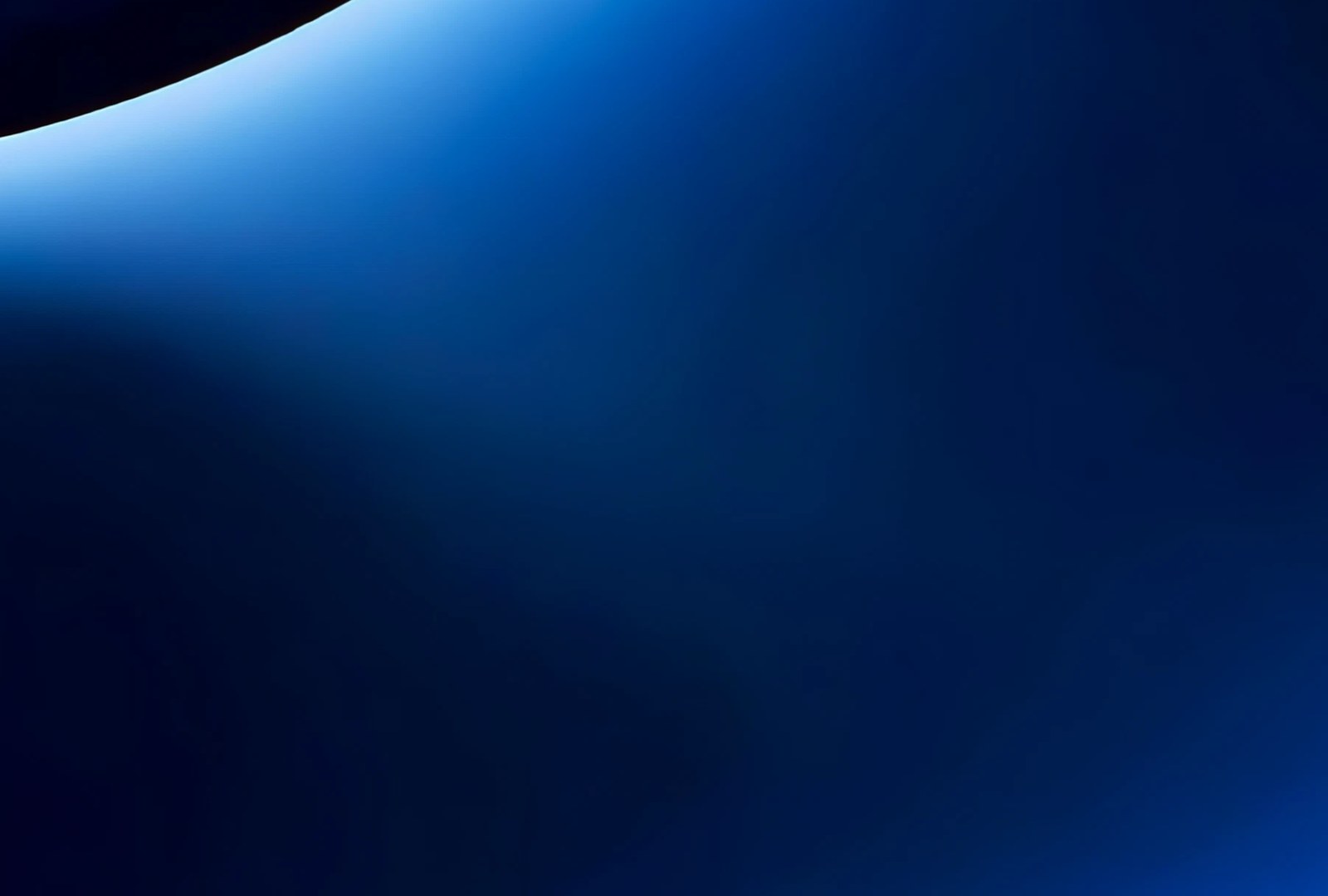 Fincantieri | Group - Governance and Ethics - Internal Control and Risk Management System: Dark blue background with a bright blue curve at the top casting light onto the darker background.
