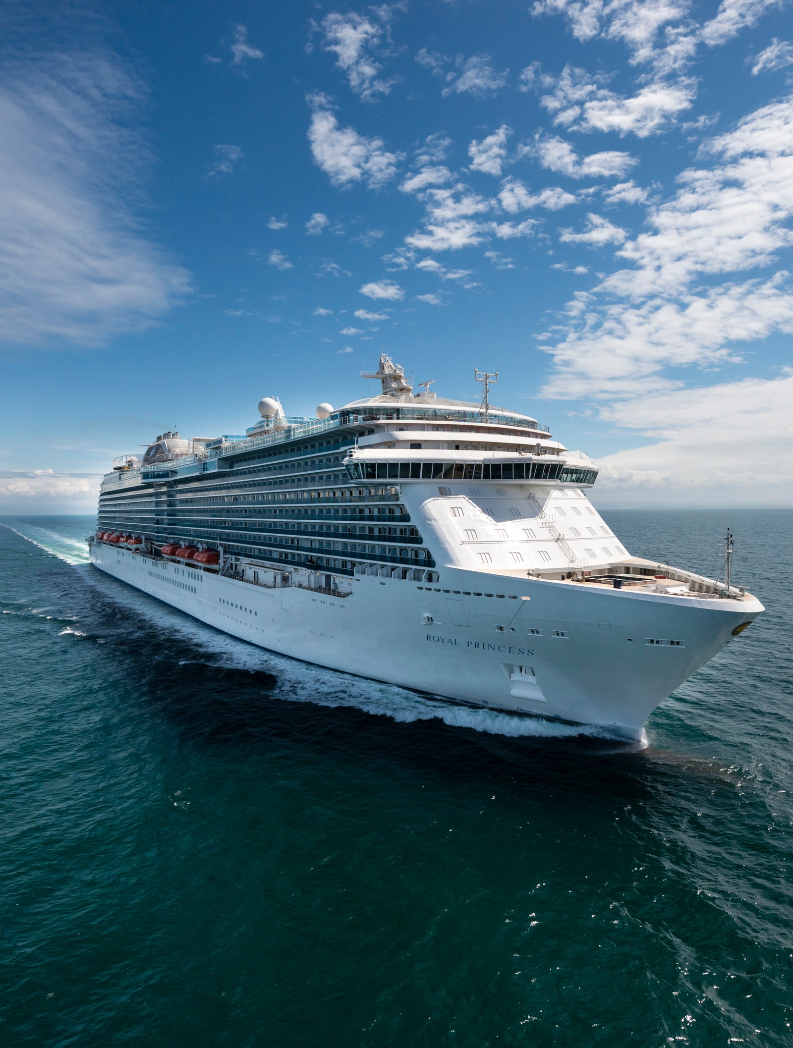 Fincantieri | Group - Business - Products - Cruise Ships - MSC Seaview: Modern cruise ship in operation navigating open sea, visible wake, horizon in background.