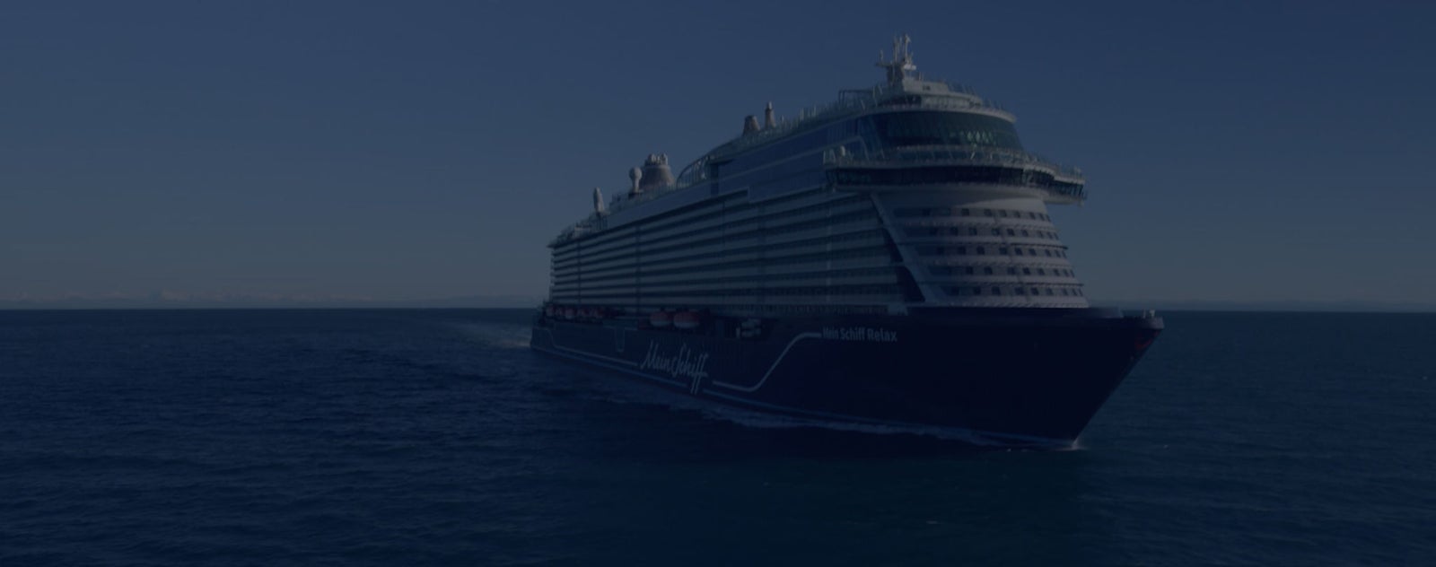 Fincantieri | Group - Business - Products - Integrated Electrical, Electronic and Electromechanical Systems - Promotional banner: Promotional banner with ship navigating on calm sea in background, focus on offered technological solutions.